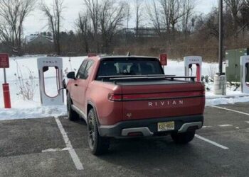 Rivian Adopts Tesla’s EV Charging Standard, Joining Ford, GM