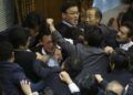 Watch: Japan’s Parliament Erupts In Scuffle Over Immigration Reform