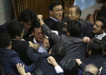 Watch: Japan’s Parliament Erupts In Scuffle Over Immigration Reform