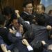 Watch: Japan’s Parliament Erupts In Scuffle Over Immigration Reform