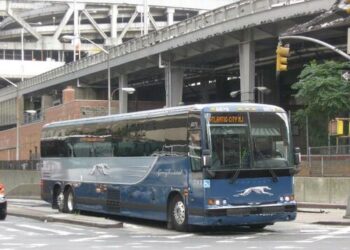 Cash-Strapped Consumers Travel By Bus To Destination Hotspots