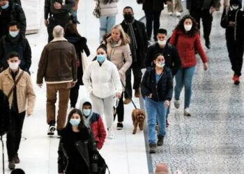 Americans Divided As Mask Mandates Make Comeback Amid COVID-19 Surge