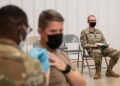Military Agrees To Pay $1.8 Million To Settle Lawsuits From COVID Vaccine Mandate